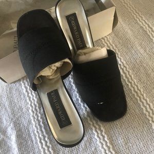 Used black slides size 7.5